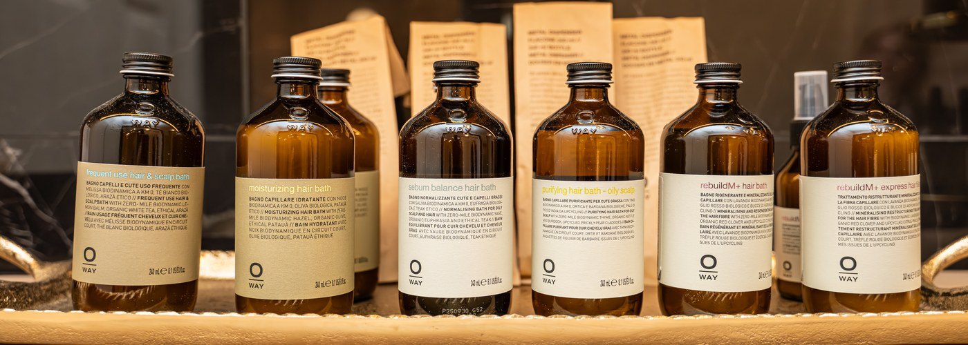The Oway Hair Bath range in glass bottles