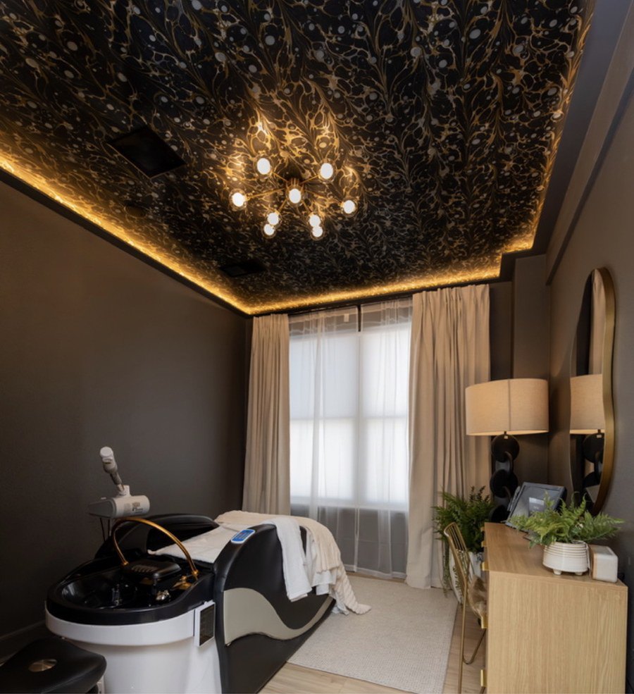 Private treatment room with custom head spa bed